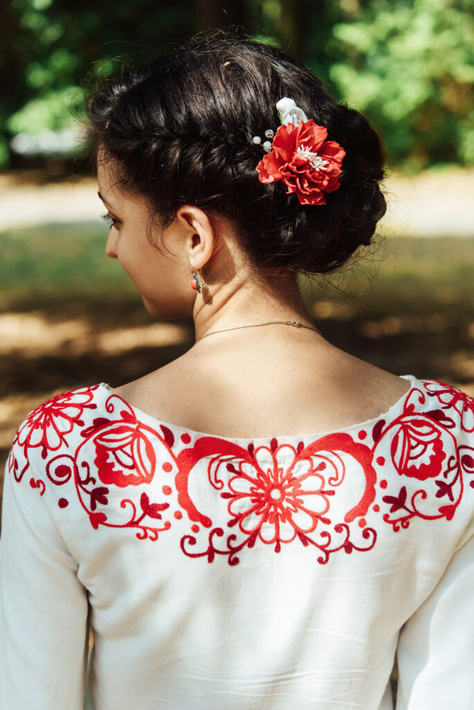 happy gorgeous bride portrait in wedding day on a background of amazing sunny trees in a park